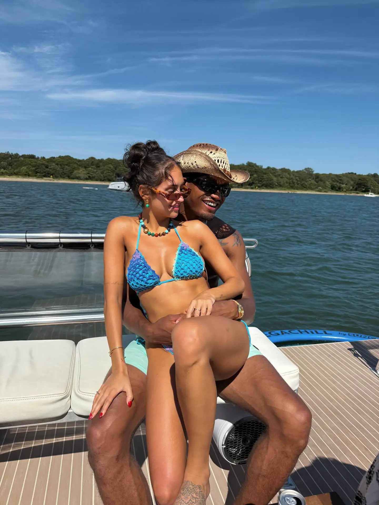 KJ Dillard and Dara Levitan on a boat.