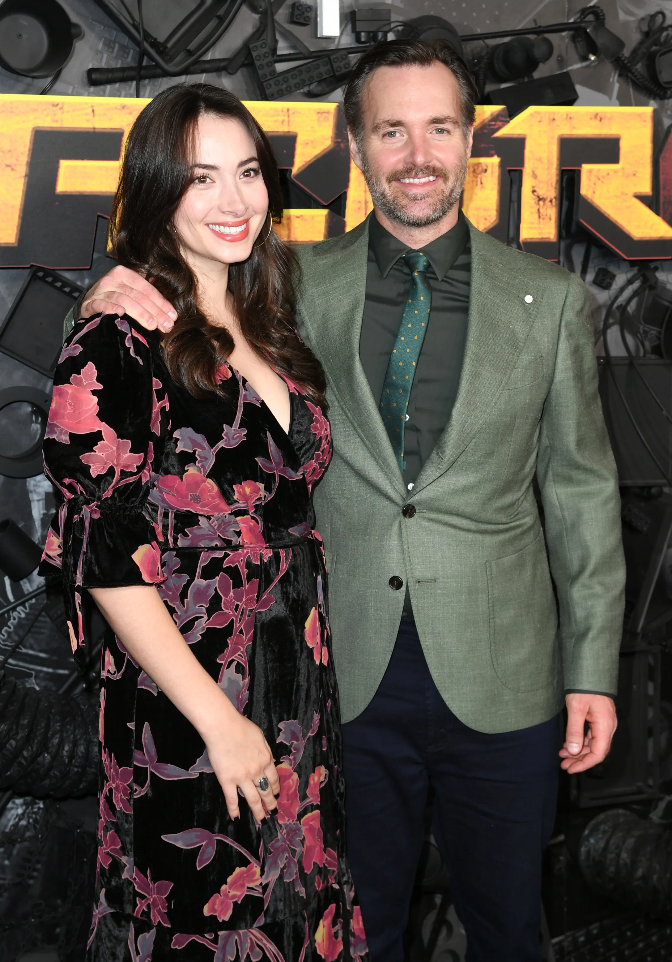 Olivia Modling and Will Forte pose on the red carpet at the "MacGruber" premiere.