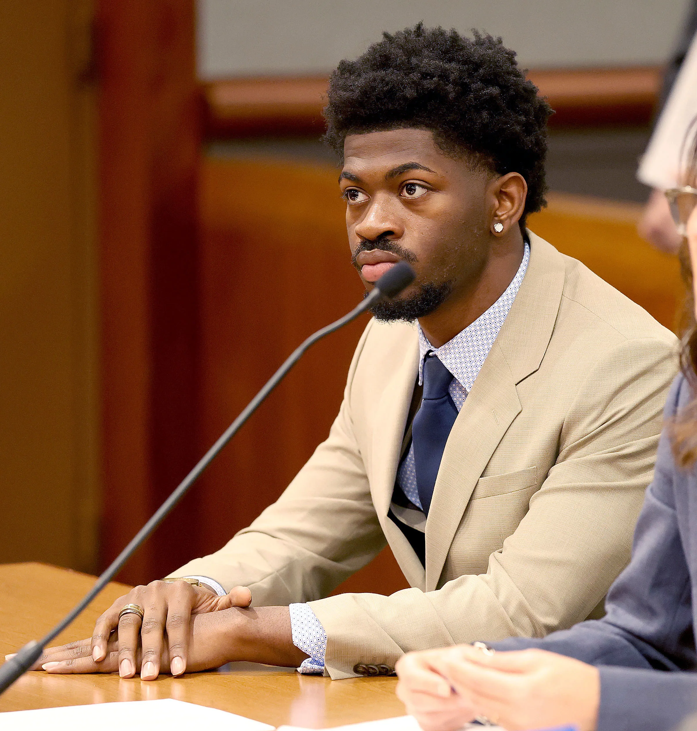 Lil Nas X sitting in Los Angeles Superior Court.