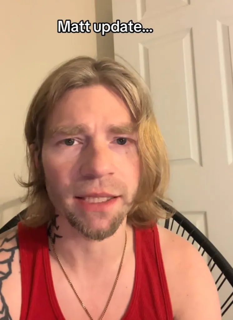 Bear Brown in a red tank top with a gold chain, speaking in a video titled "Matt update..."