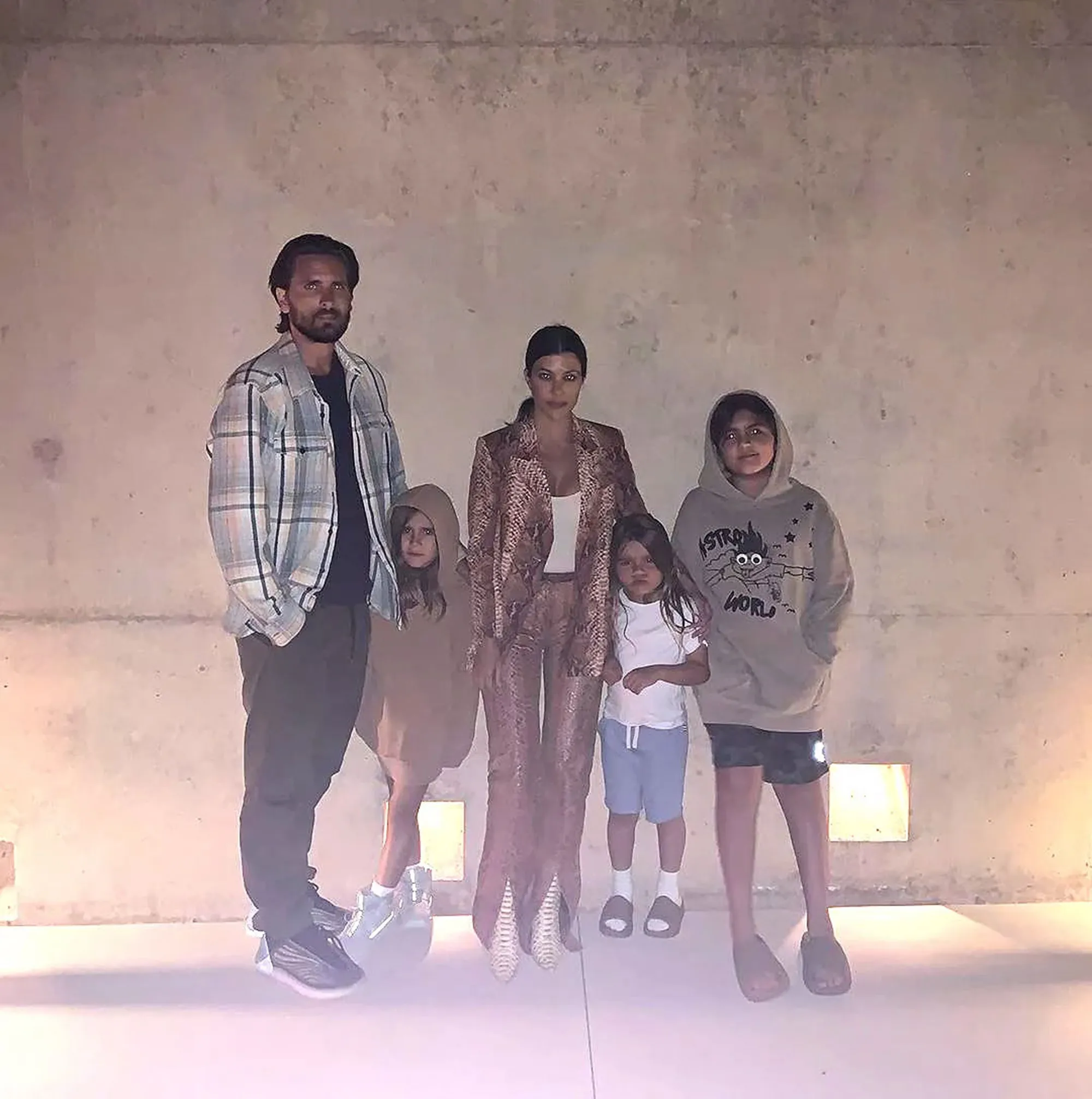 Scott Disick and Kourtney Kardashian with their three children.