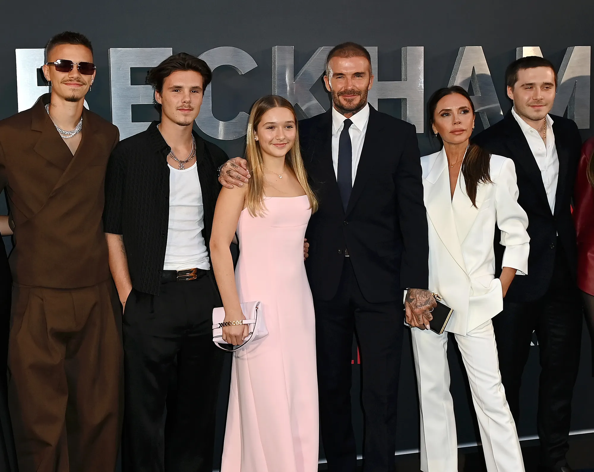 Cruz Beckham, Mia Regan, Romeo Beckham, David Beckham, Victoria Beckham, and Brooklyn Beckham attend the "Beckham" Premiere.