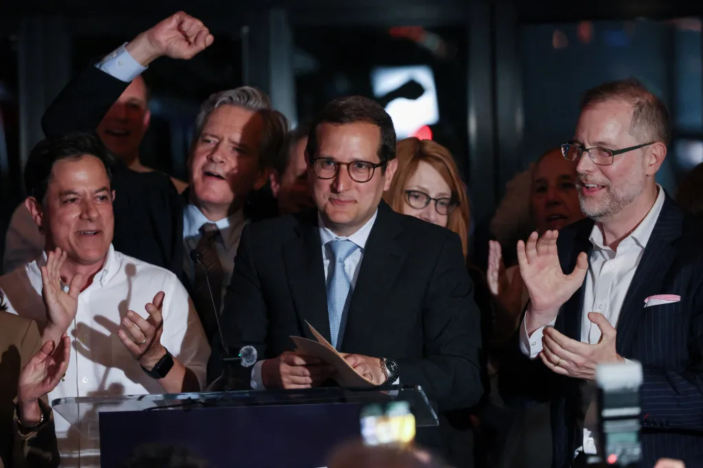 Micah Lasher, Democratic primary winner for New York's 12th Congressional District, celebrates with supporters in New York City, U.S., June 23, 2026.