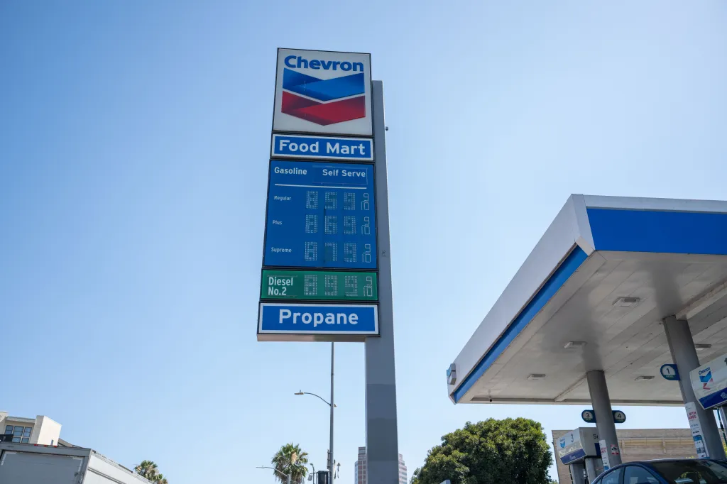 A Chevron gas station sign in Los Angeles displays gas prices over $8.50 per gallon.