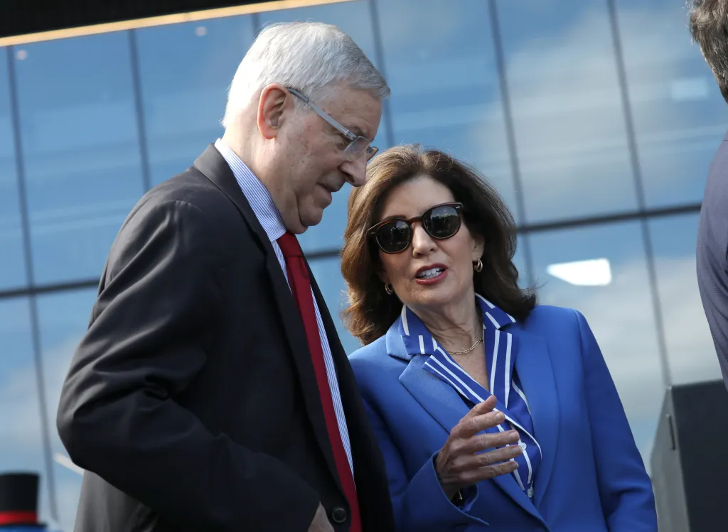 New York Governor Kathy Hochul talks with Buffalo Bills owner Terry Pegula at the ribbon cutting ceremony for Highmark Stadium.