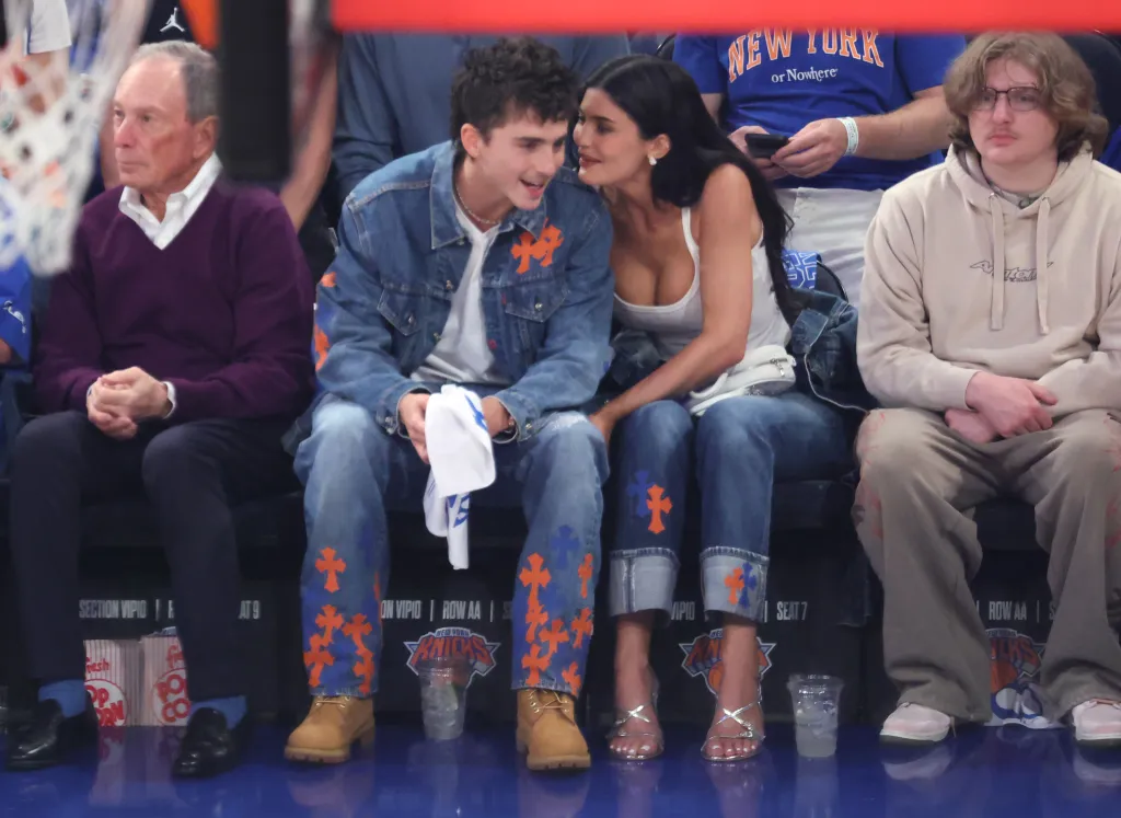 Timothée Chalamet and Kylie Jenner seated courtside at the New York Knicks vs. San Antonio Spurs game at Madison Square Garden.