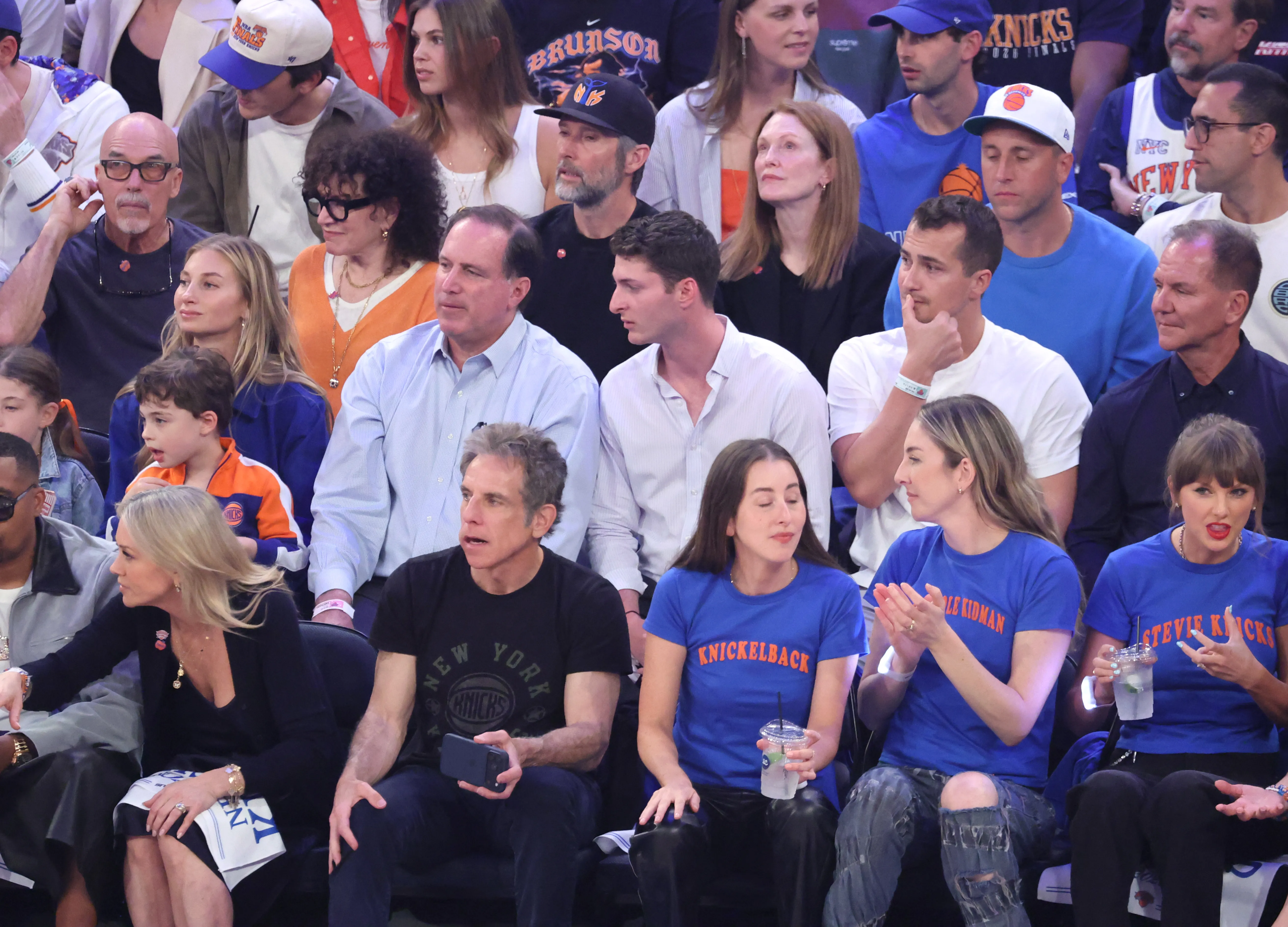 Celebrities Susie Essman, Julianne Moore, Ben Stiller, and Taylor Swift in the audience at the NBA Finals.