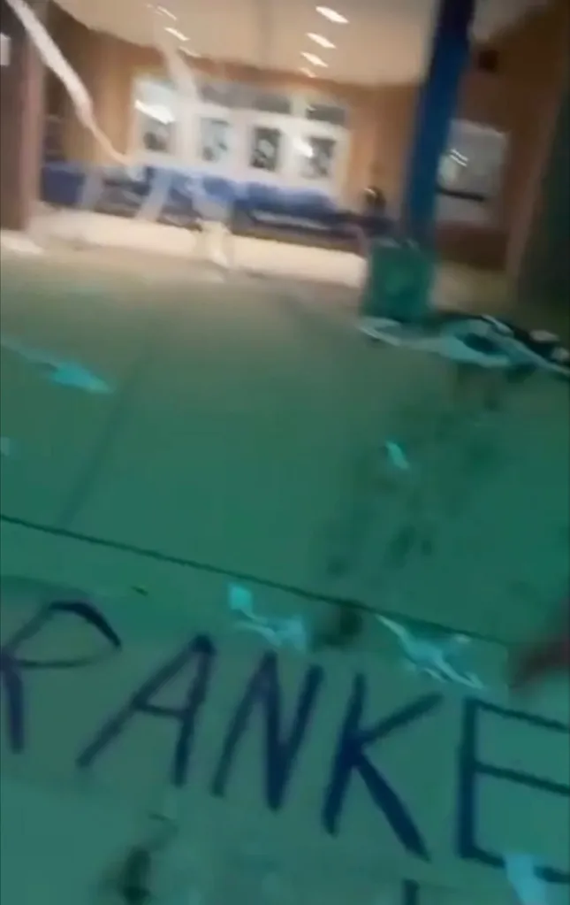 Toilet paper hung from the main entrance, and "Got Pranked" was written on the walkway outside the school.
