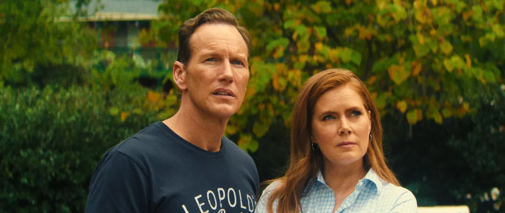 Patrick Wilson and Amy Adams looking concerned.