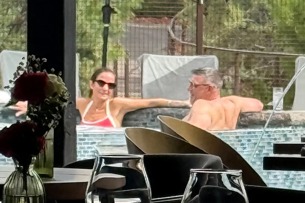 Mike Vrabel and Dianna Russini in a hot tub.
