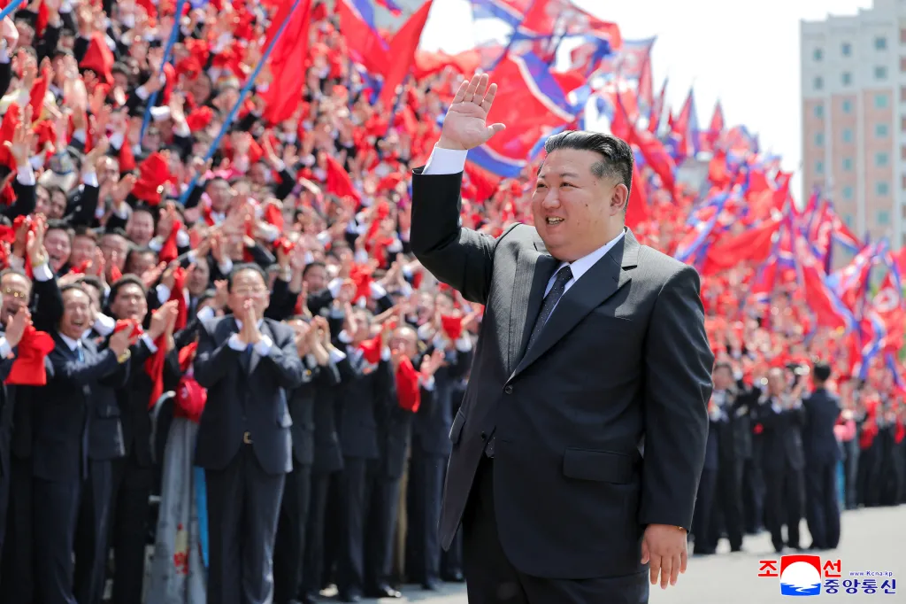 Kim Jong Un meeting with participants in the 9th Congress of the General Federation of Trade Unions of Korea in front of the People's Palace of Culture in Pyongyang.