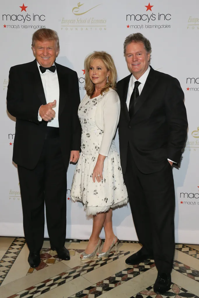 Donald Trump, Kathy Hilton, and Rick Hilton posing for a photo.