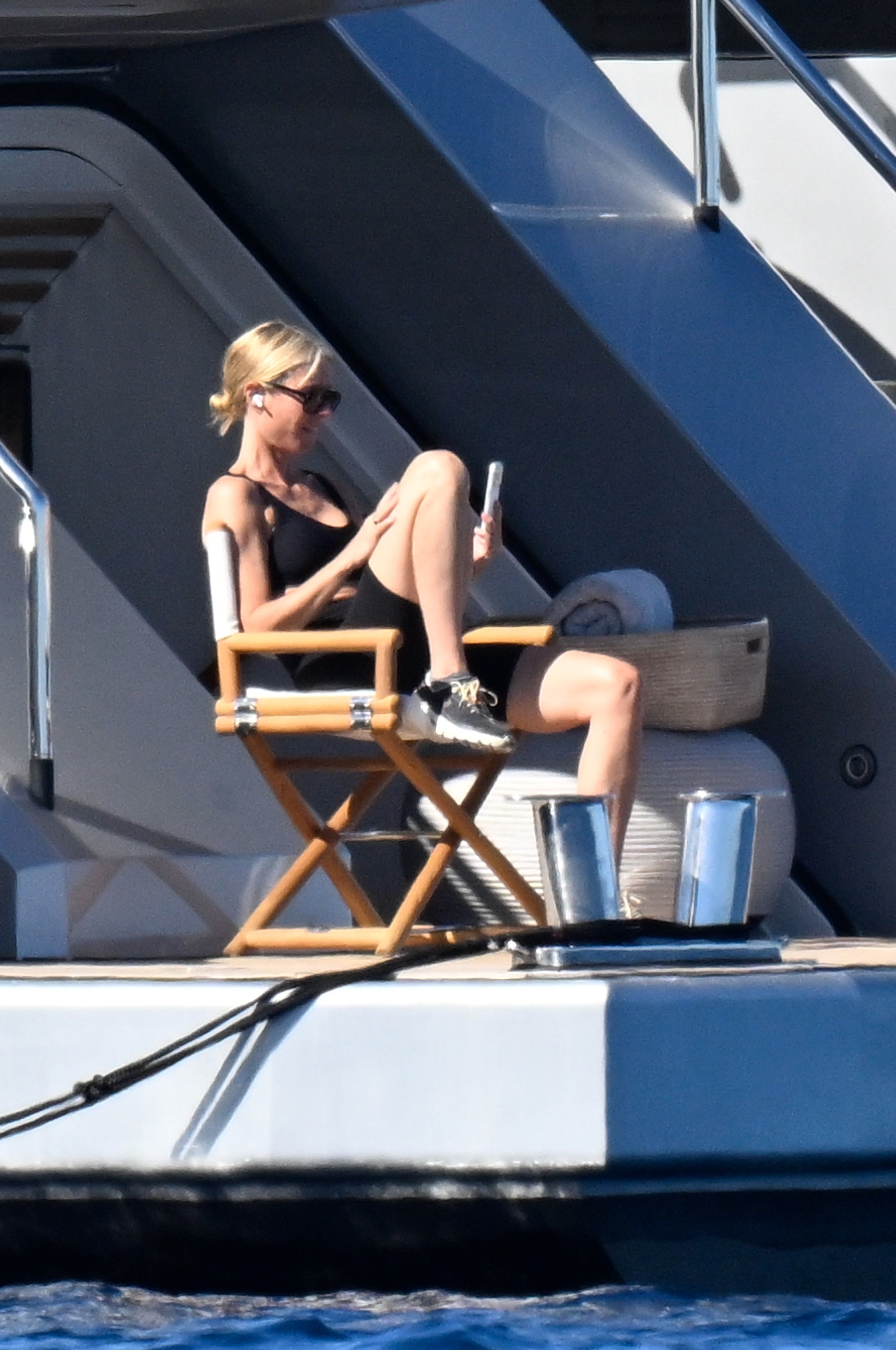 Gwyneth Paltrow sunbathing on a yacht.