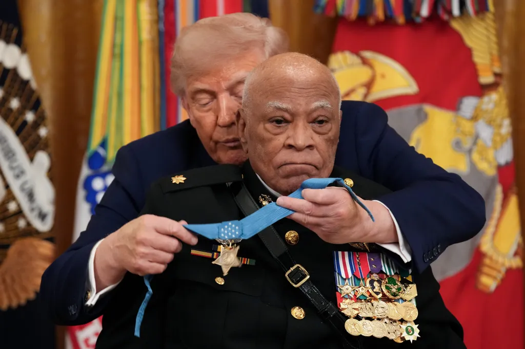 President Donald Trump presenting the Medal of Honor to Marine Major James Capers Jr.