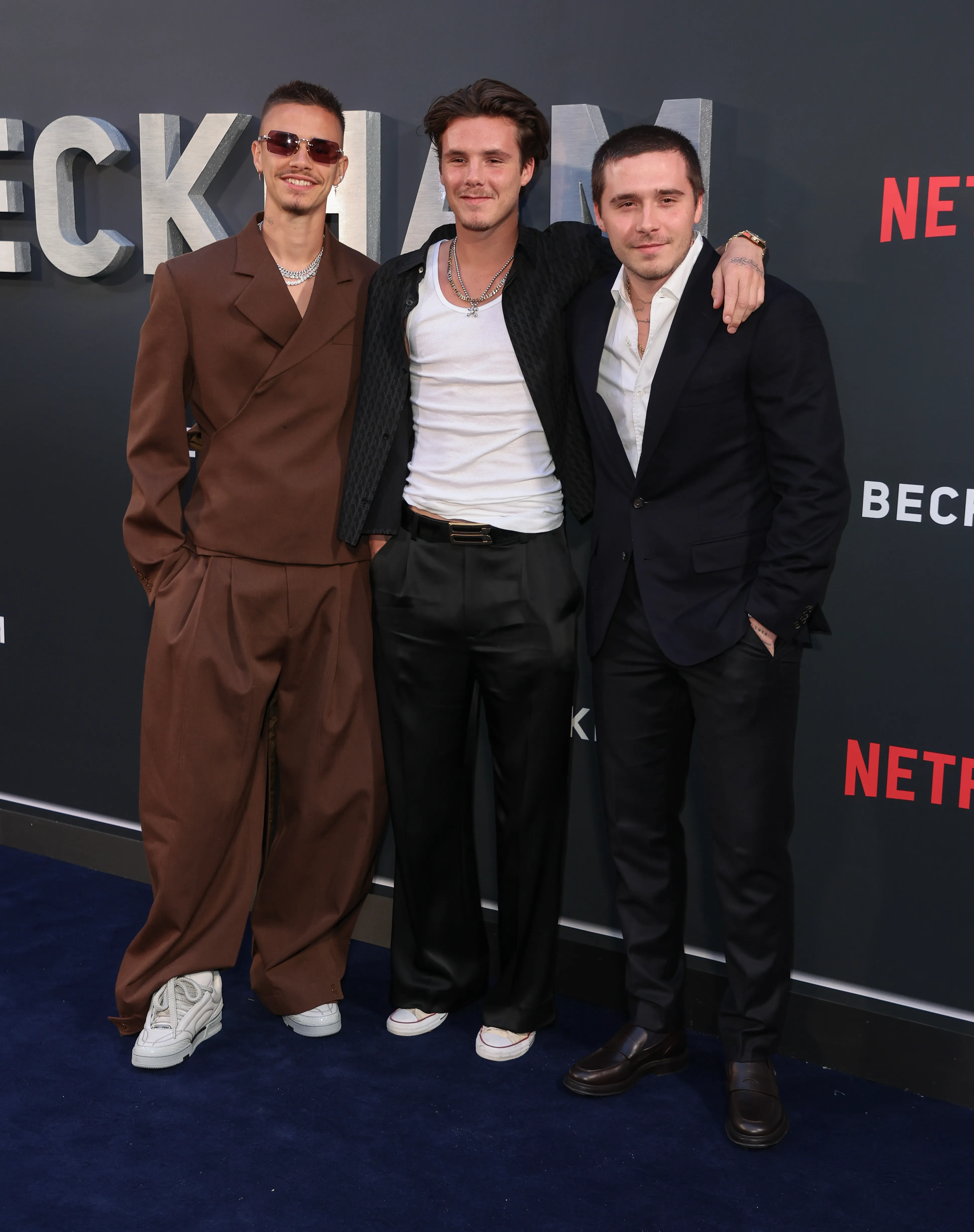 Romeo, Cruz and Brooklyn Beckham at the "Beckham" UK premiere in October 2023