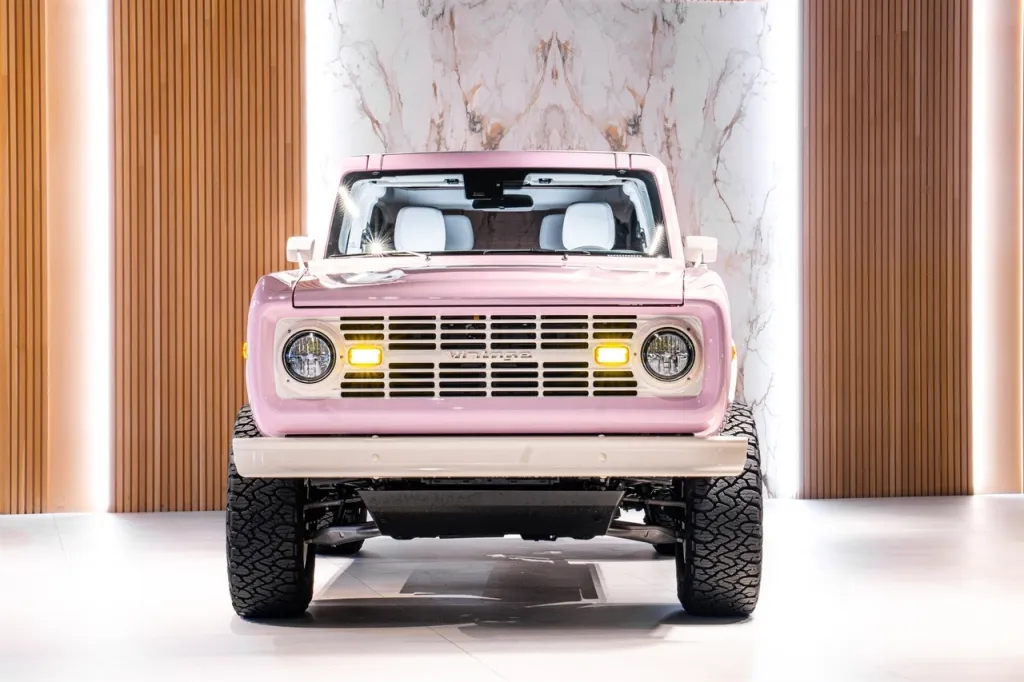 A light pink 2023 Ford Bronco with "Vintage" written on its grille.