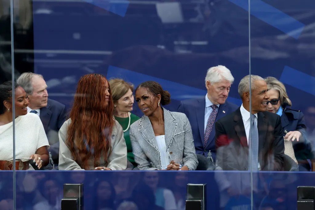 Attendees including Barack Obama and George W. Bush gather for the dedication ceremony of the Barack Obama Presidential Center.