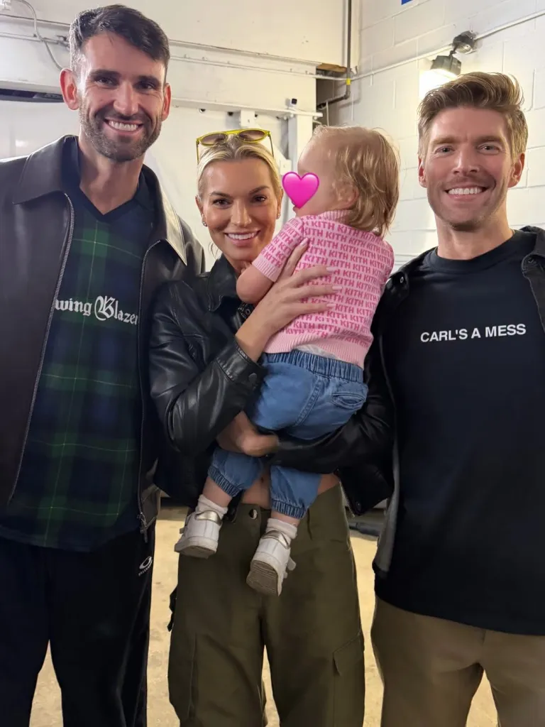 Carl Radke, Lindsay Hubbard, and Kyle Cooke with a baby.
