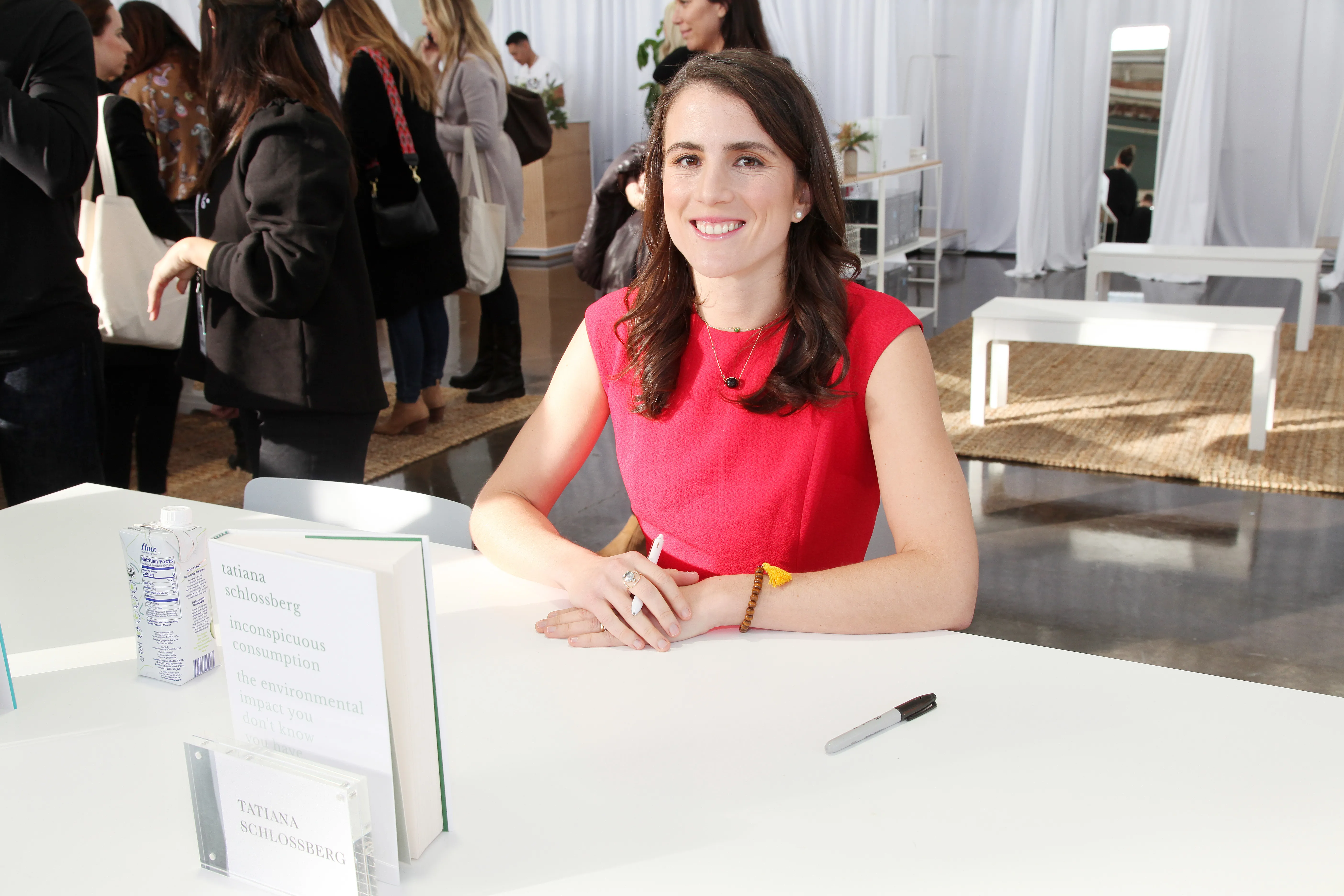 Tatiana Schlossberg smiling at her book signing for "Inconspicuous Consumption."