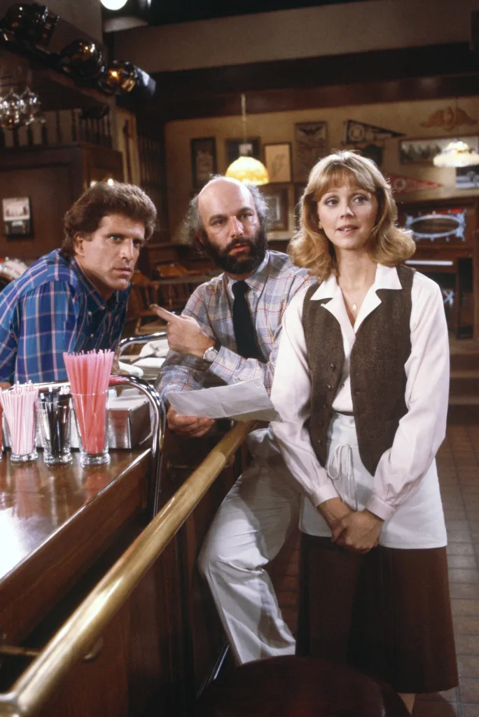Ted Danson, James Burrows, and Shelley Long on the set of "Cheers."
