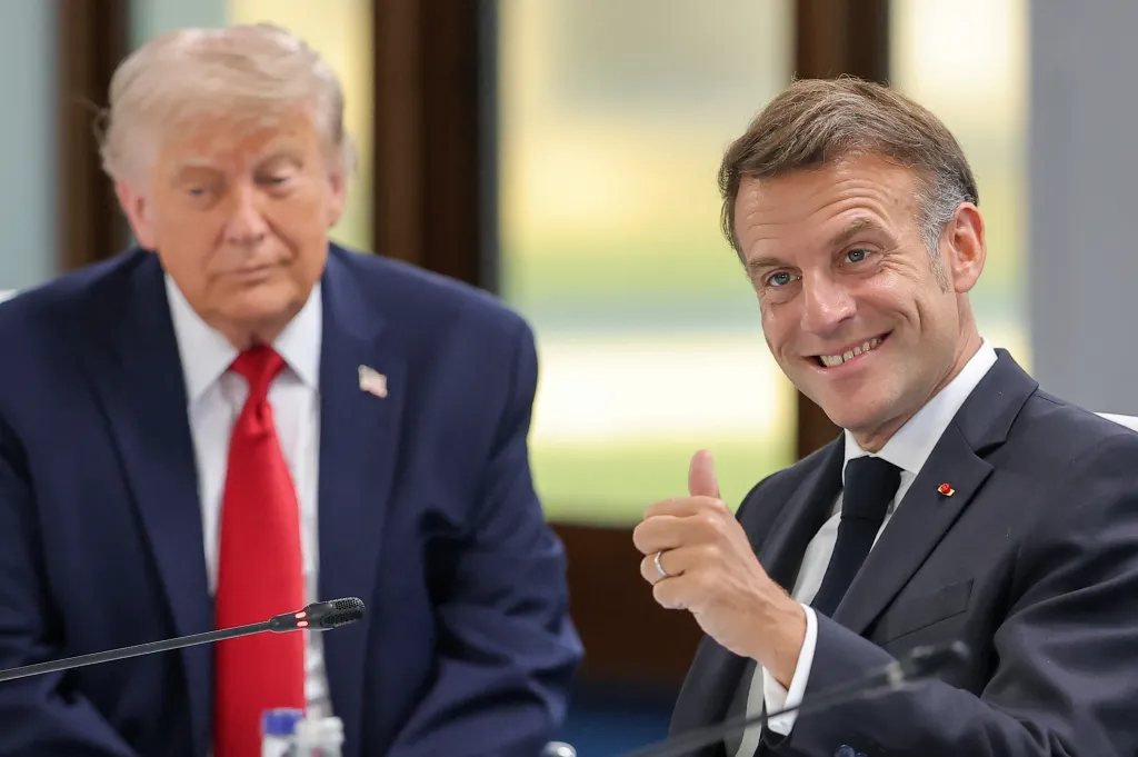 French President Emmanuel Macron giving a thumbs up next to US President Donald Trump during a G7 summit.