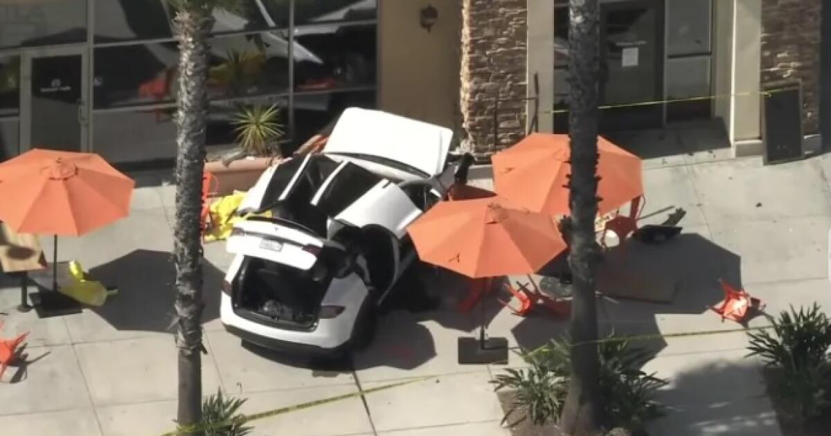 Woman pinned under Tesla in fatal crash at Simi Valley shopping center