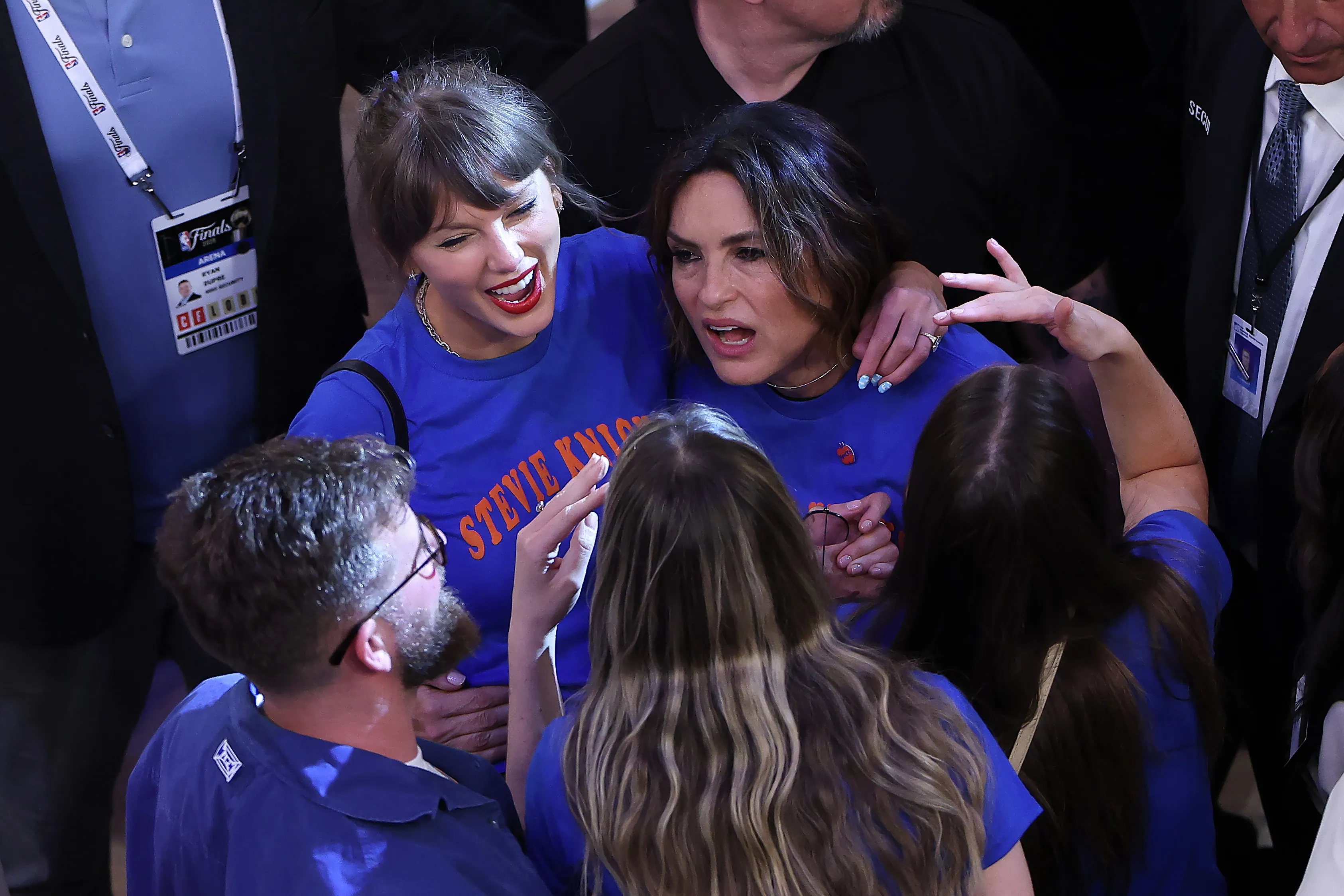 Taylor Swift and Mariska Hargitay reacting excitedly at an NBA Finals game.