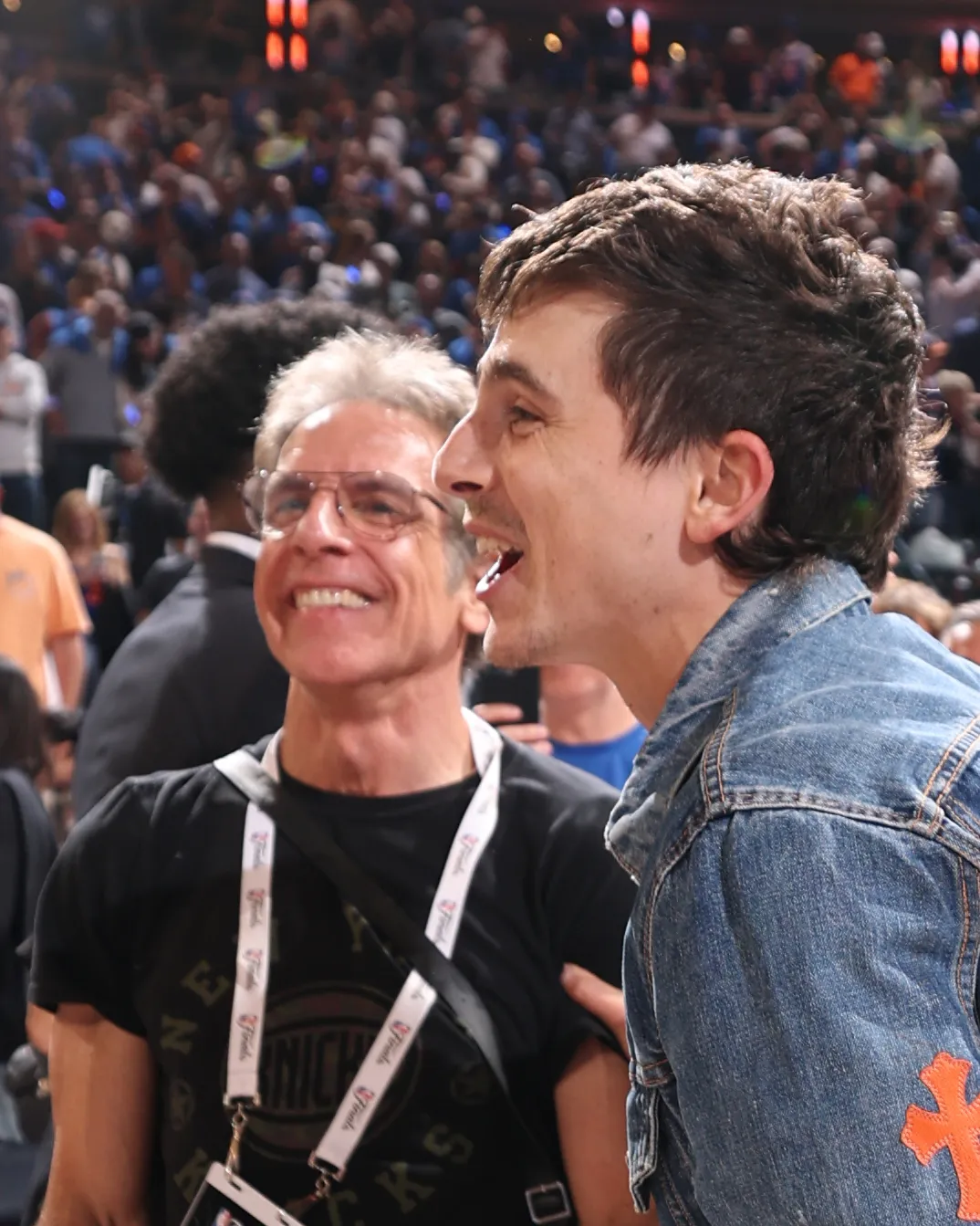 Ben Stiller and Timothee Chalamet celebrating at the NBA Finals.