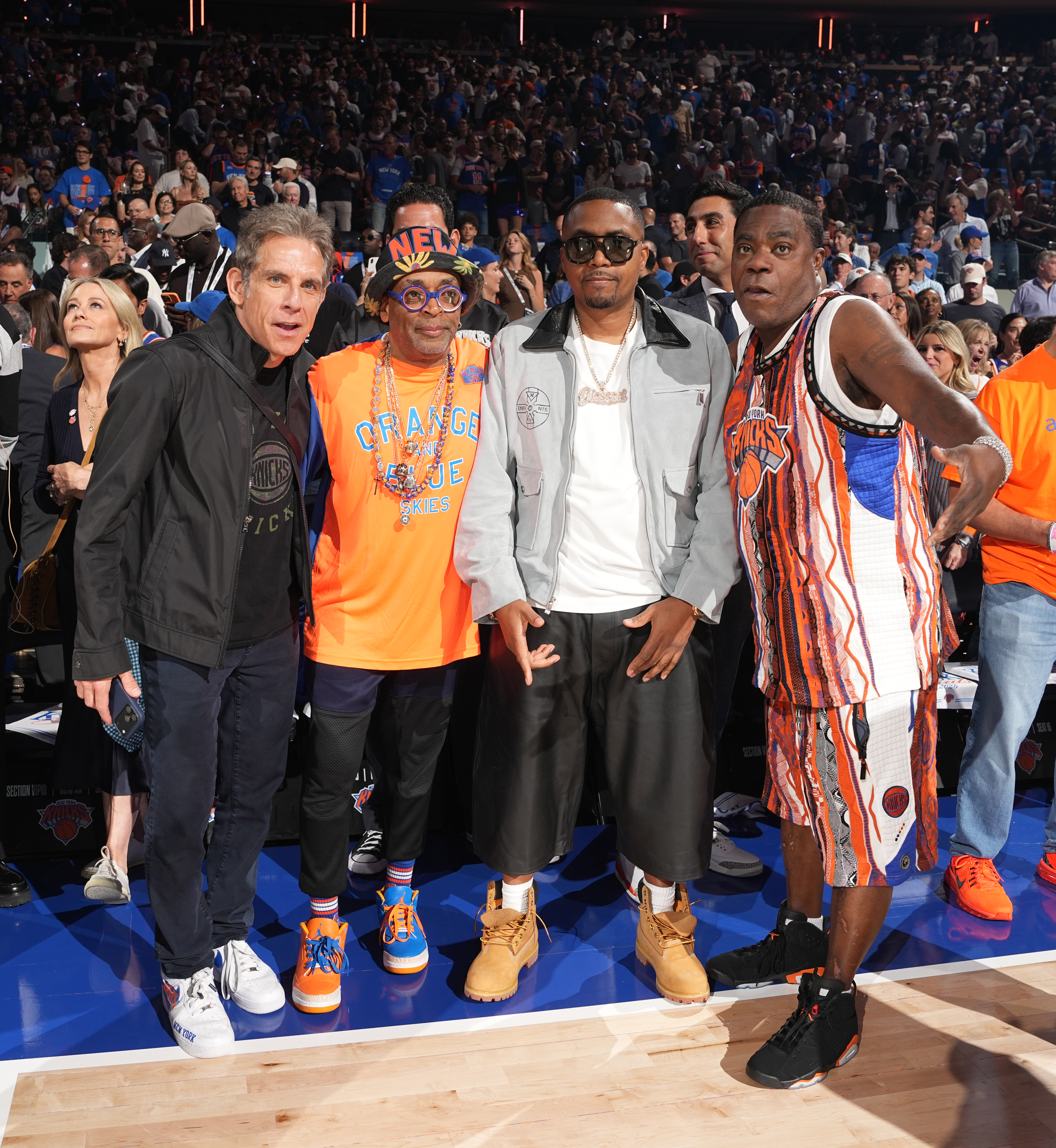 Ben Stiller, Spike Lee, Nas, and Tracy Morgan pose for a photo at an NBA Finals game.