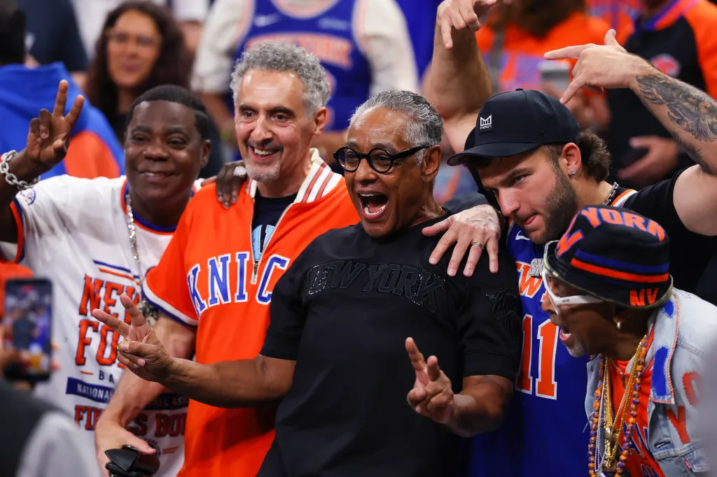 Tracy Morgan, John Turturro, and Giancarlo Esposito posing for a photo during the 2026 NBA Finals.