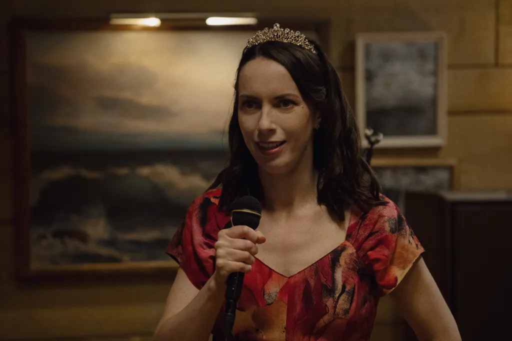 Kate O'Flynn as Widow in 