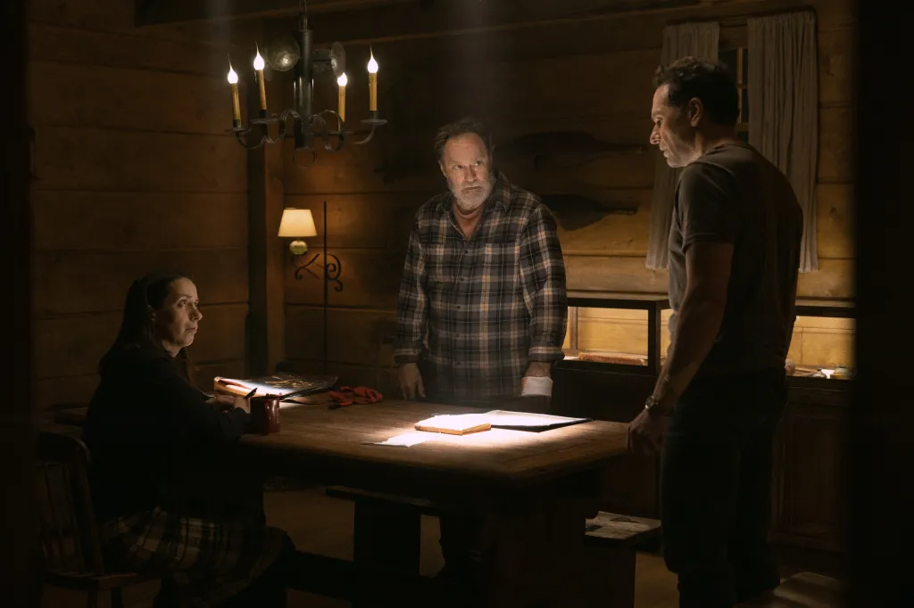 Matthew Rhys, Kate O'Flynn, and Stephen Root in a scene from 