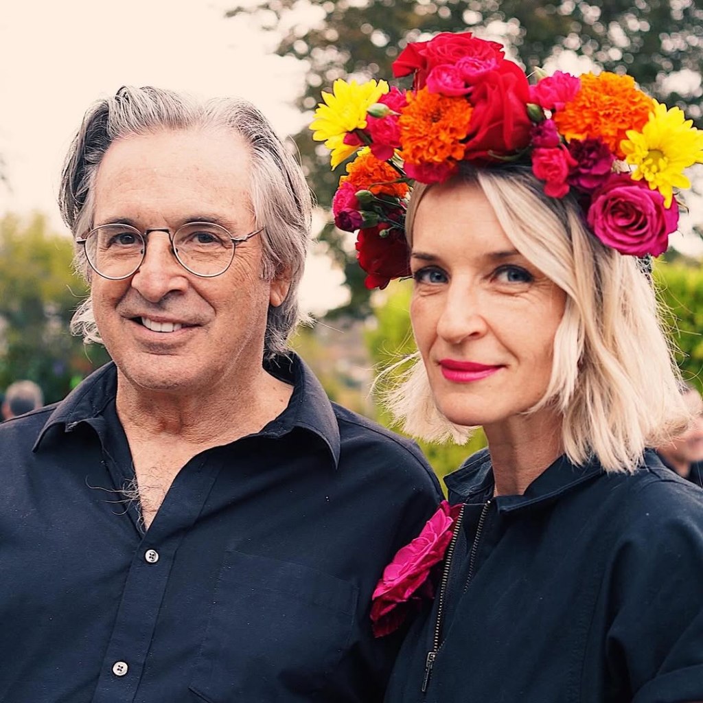 Robert and Ever Carradine posing for a photo.