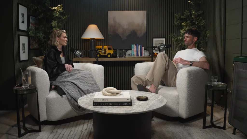 Two people sitting in armchairs talking on a podcast called "More Life."