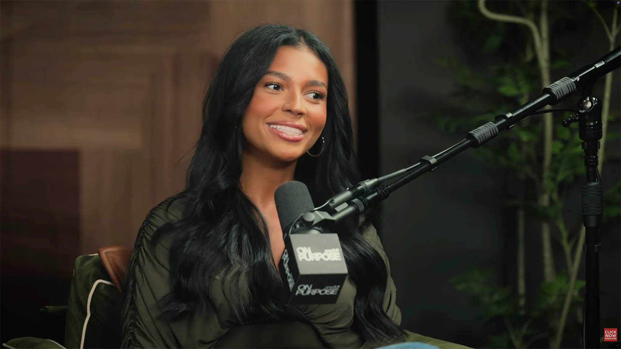 Layla Taylor sitting next to a microphone with "On Purpose" written on it.