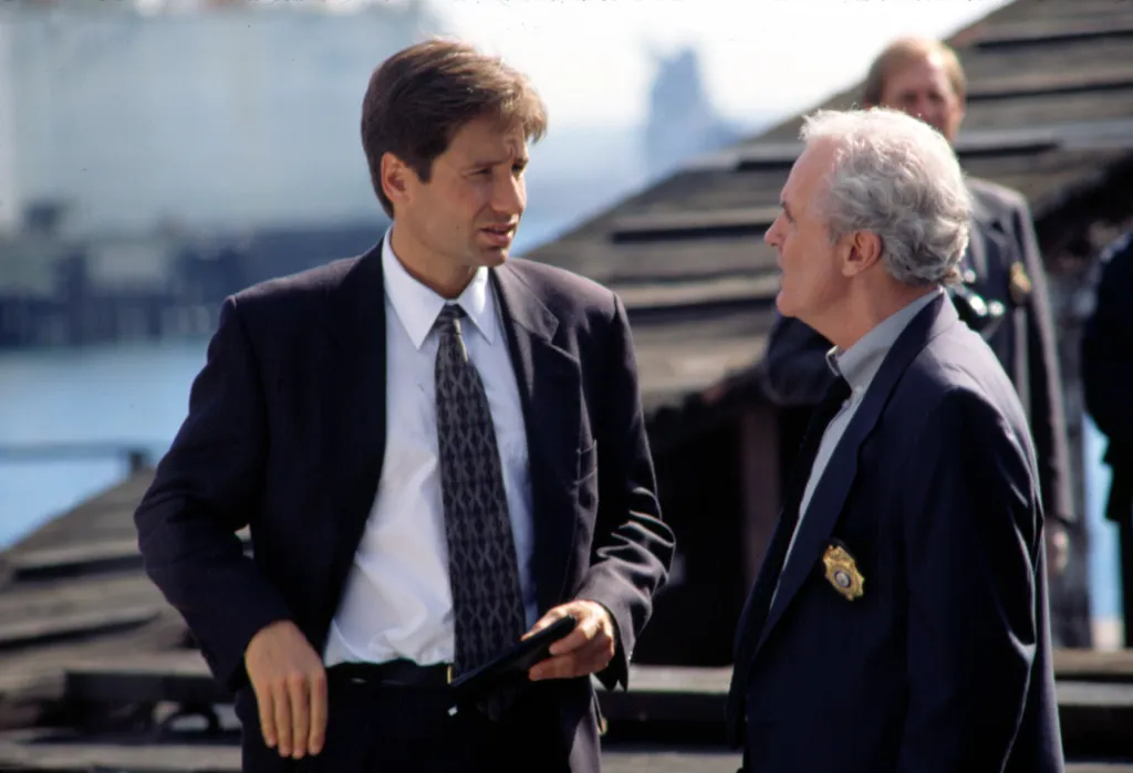 David Duchovny and James Handy talking in "The X-Files" episode "2Shy."