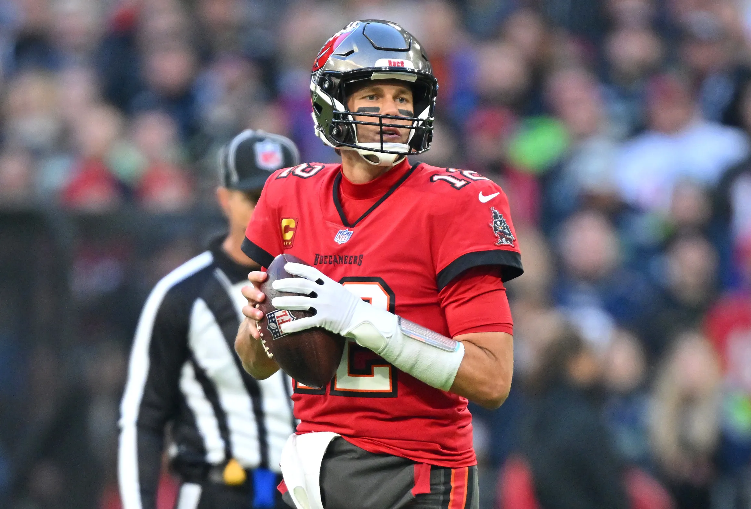 Tom Brady of the Tampa Bay Buccaneers preparing to throw a football.