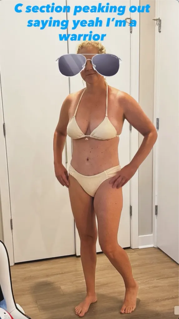 A woman in a cream bikini with cartoon sunglasses covering her eyes, standing with hands on her hips, with text above her head.
