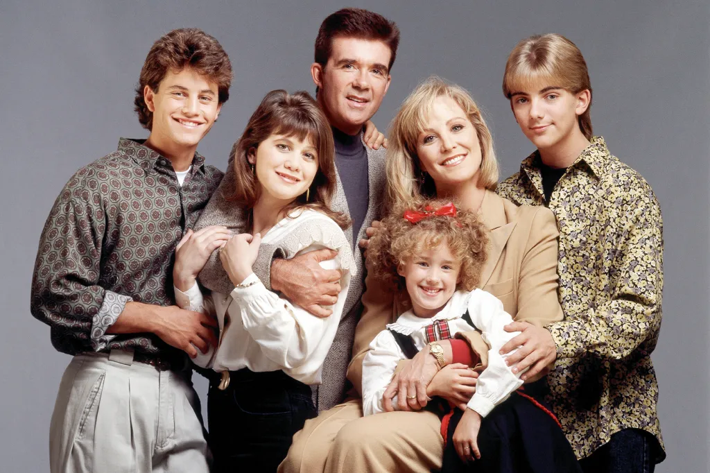 The cast of the TV show Growing Pains poses for a portrait.