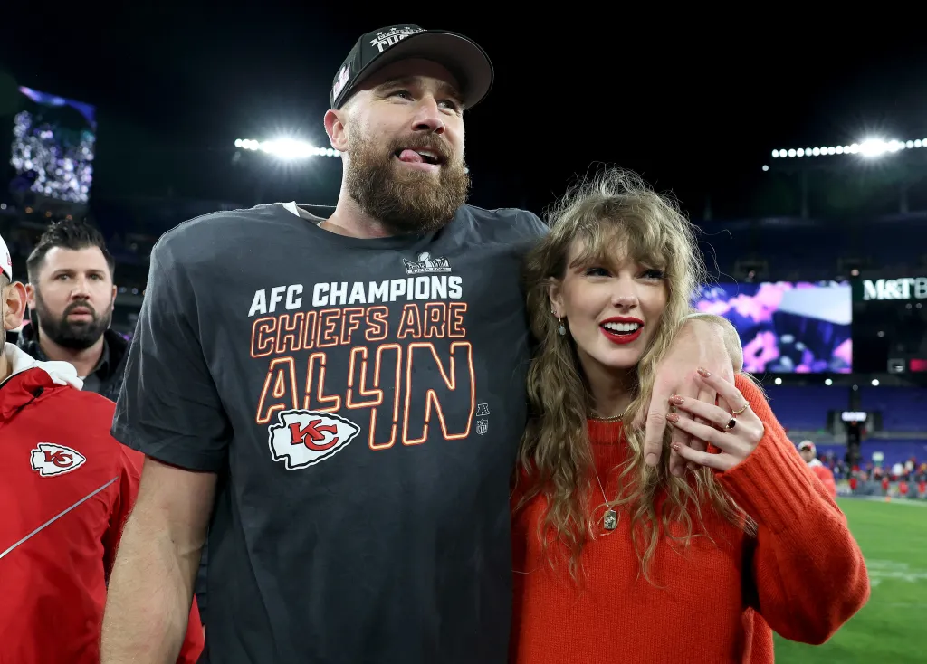 Travis Kelce of the Kansas City Chiefs and Taylor Swift celebrate a 17-10 victory against the Baltimore Ravens.