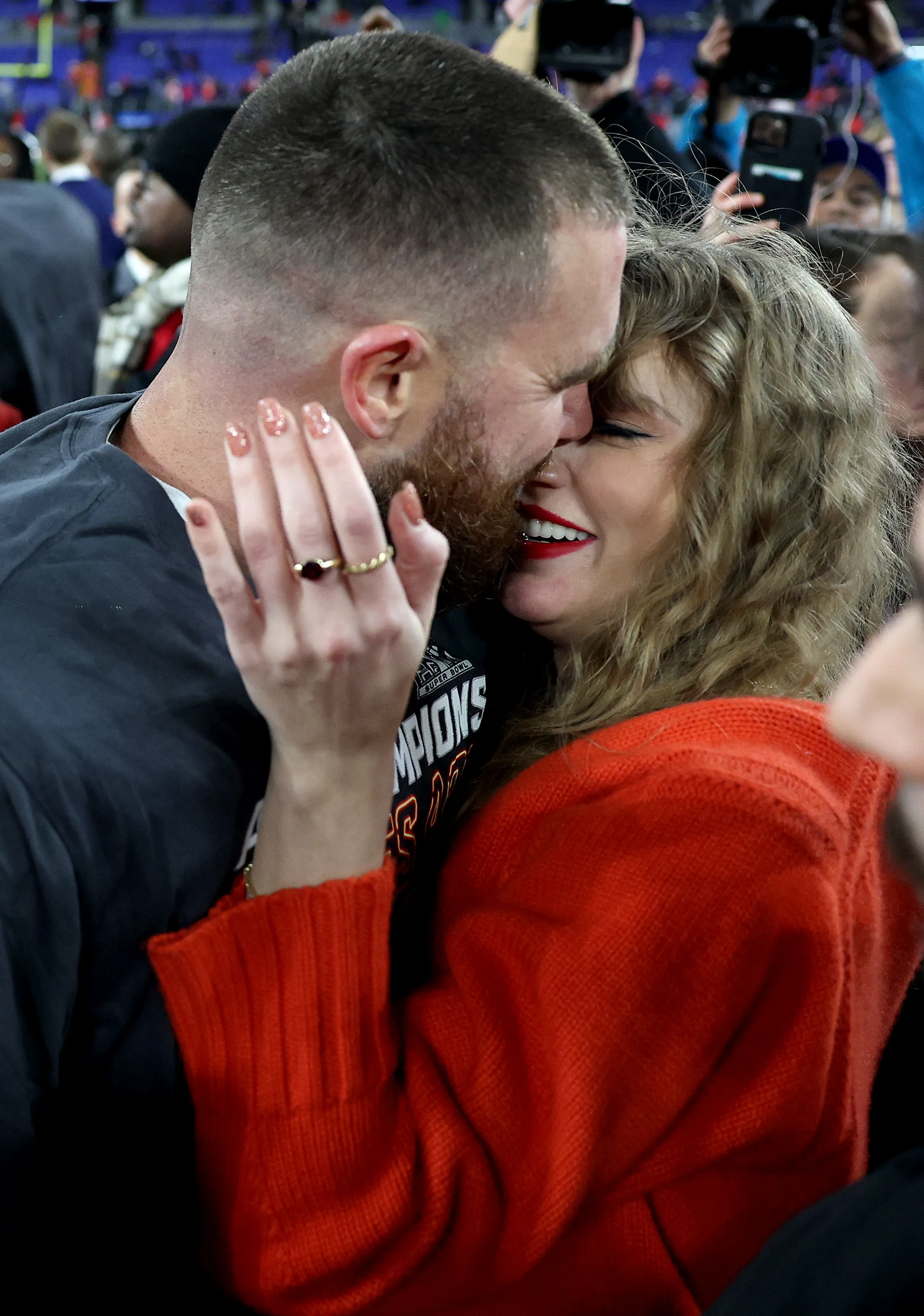 Travis Kelce and Taylor Swift celebrating the Kansas City Chiefs' victory over the Baltimore Ravens.