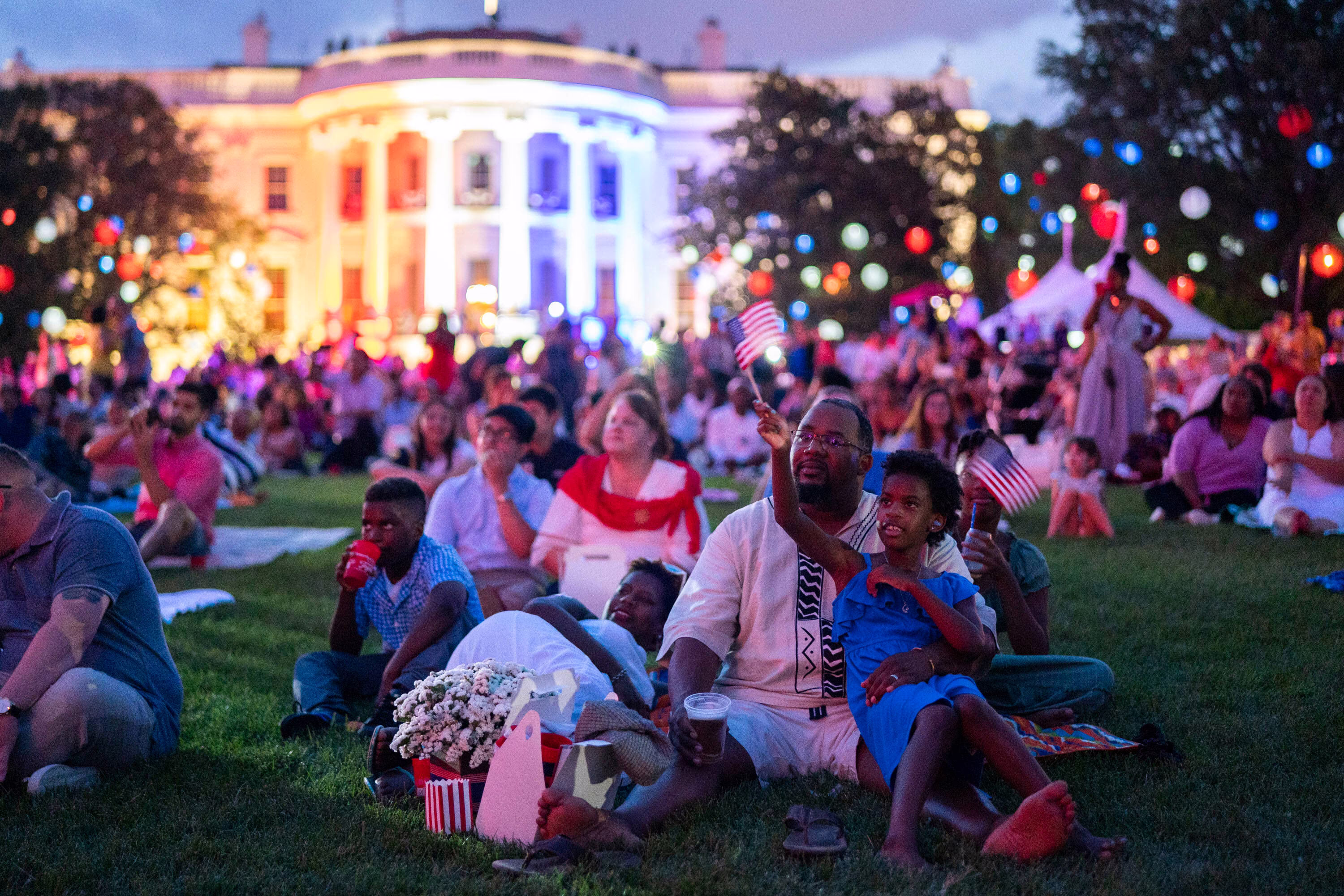 People watch fireworks during a Fourth of July celebration on the South Lawn of the White House in 2021.