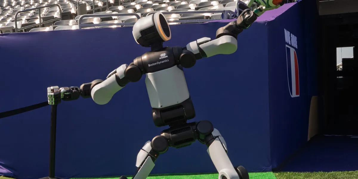 Meet the soccer-playing humanoid robot that just delivered the game ball at the Brazil v. Norway FIFA World Cup match
