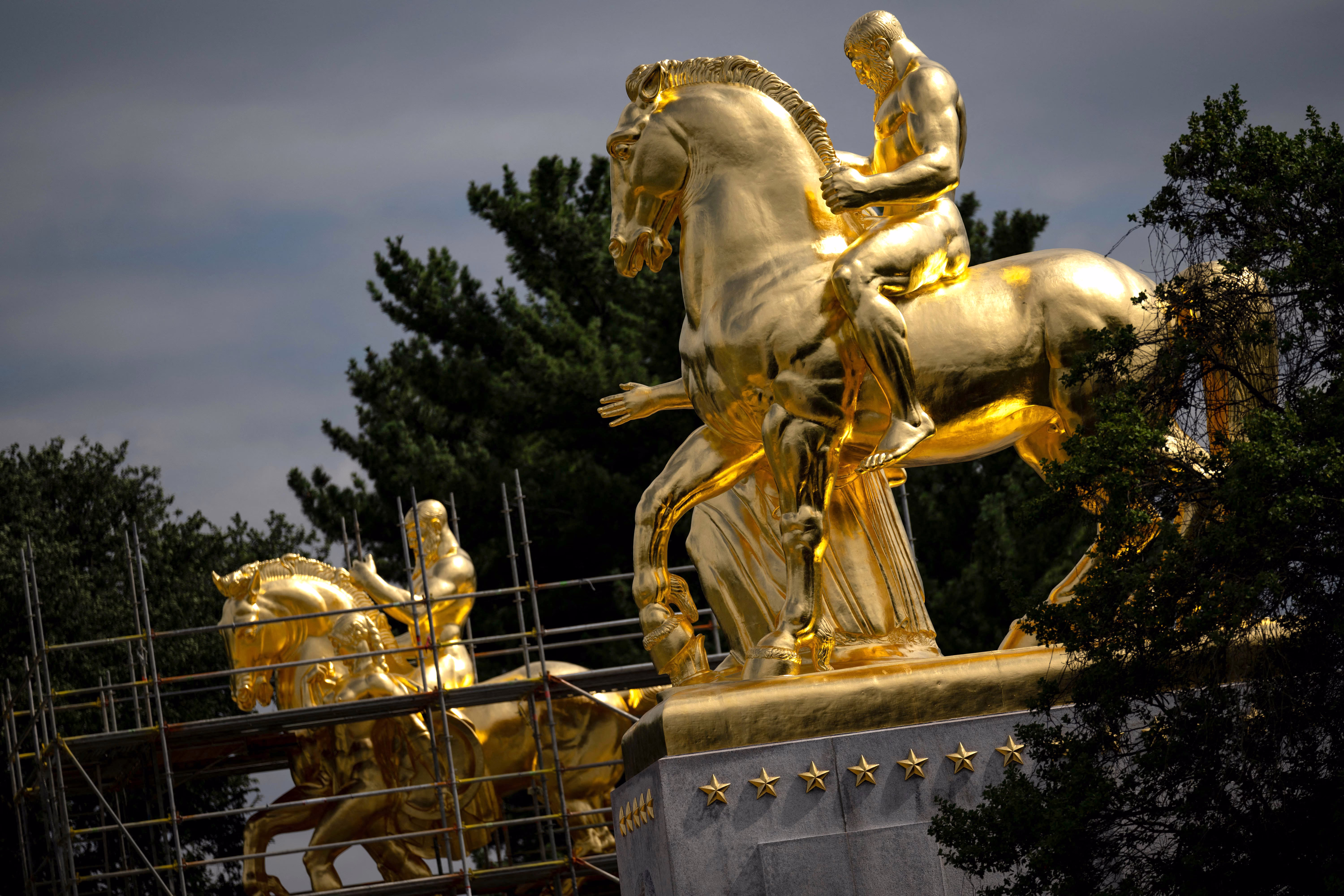 Two equestrian statues, recently re-covered in gold.