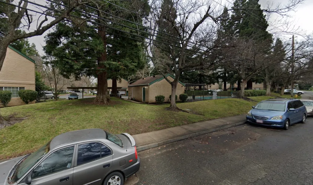 The 1800 block of Humboldt Road with several trees, residential buildings, and parked cars along the street.