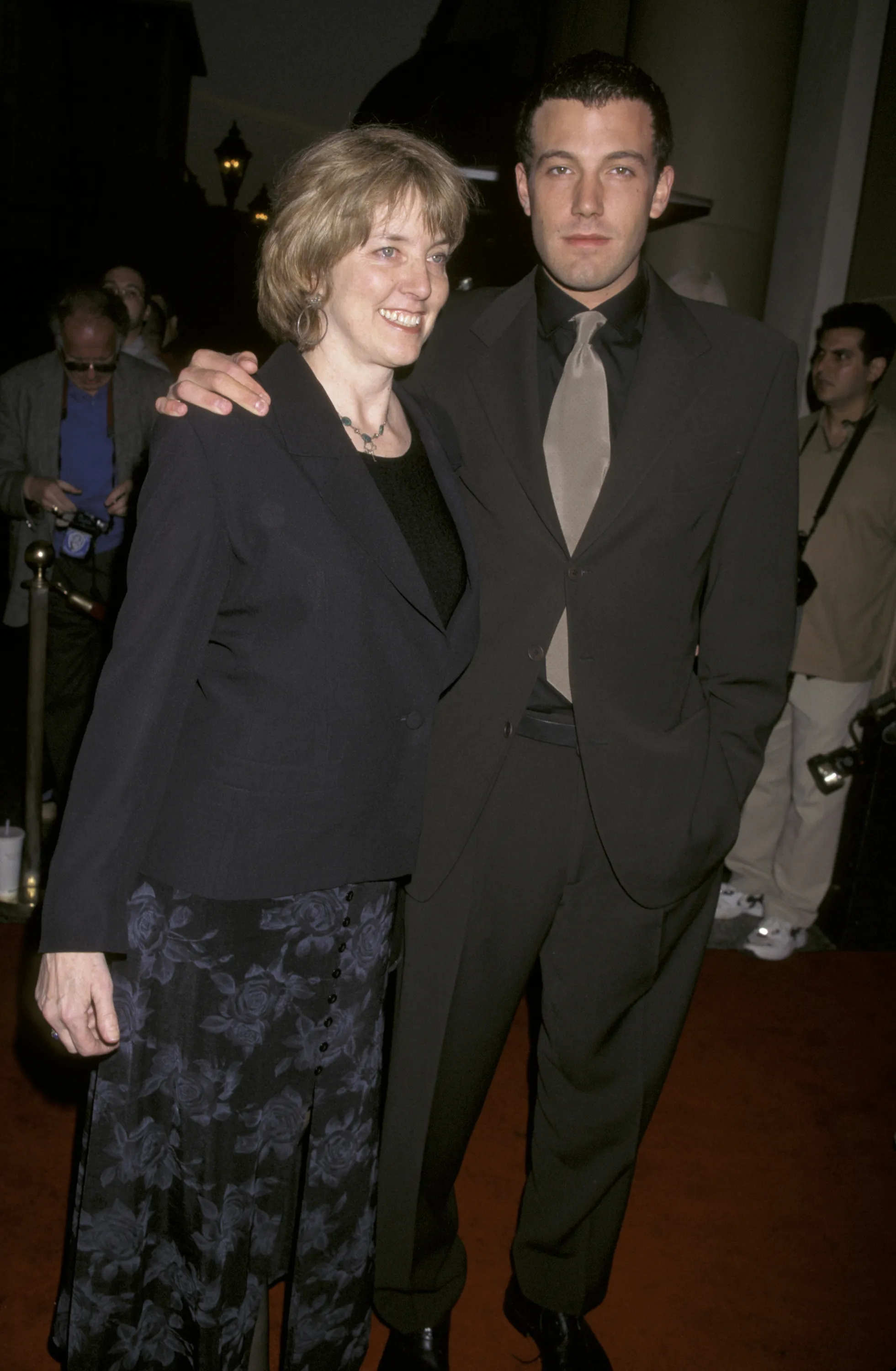 Ben Affleck and his mother, Chris, standing side-by-side.