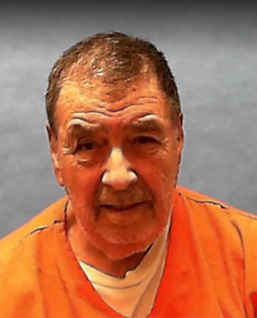 A mugshot of Dominick Occhiocone in an orange jumpsuit.