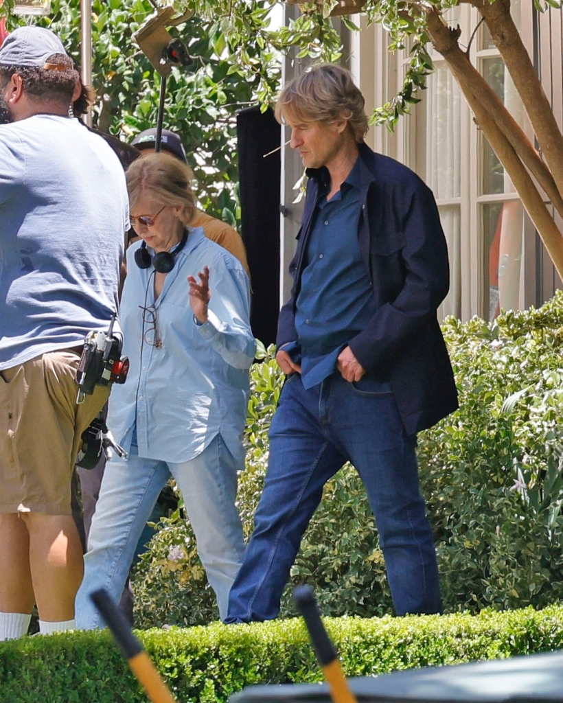Apple Martin and Owen Wilson on the set of "Paris Paramount."