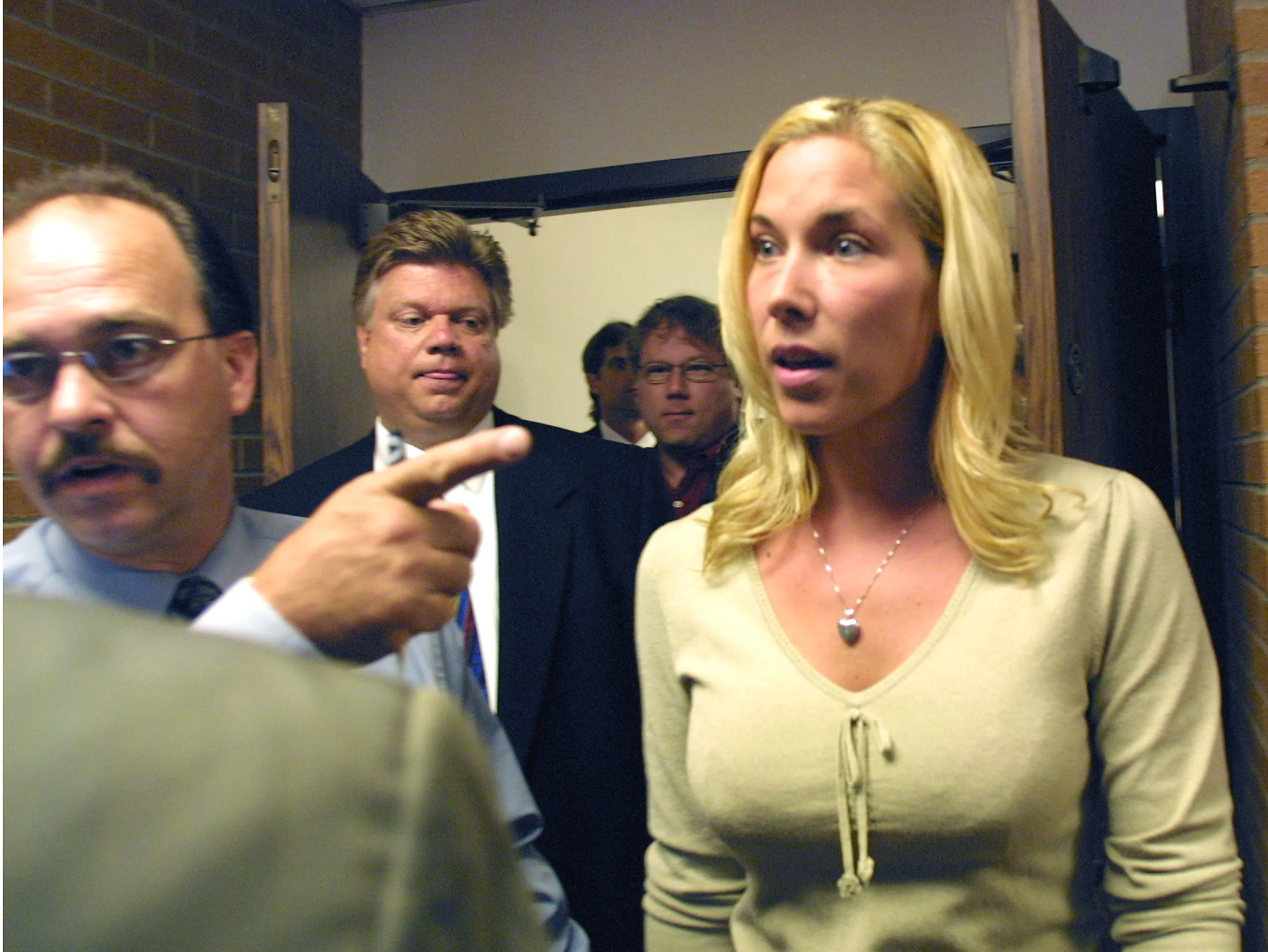 Kim Mathers, Eminem's ex-wife, leaves the courtroom in St. Clair Shores, Michigan, after her arraignment.