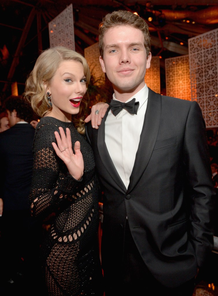 Singer Taylor Swift and Austin Swift attend the 2014 Golden Globes after party.